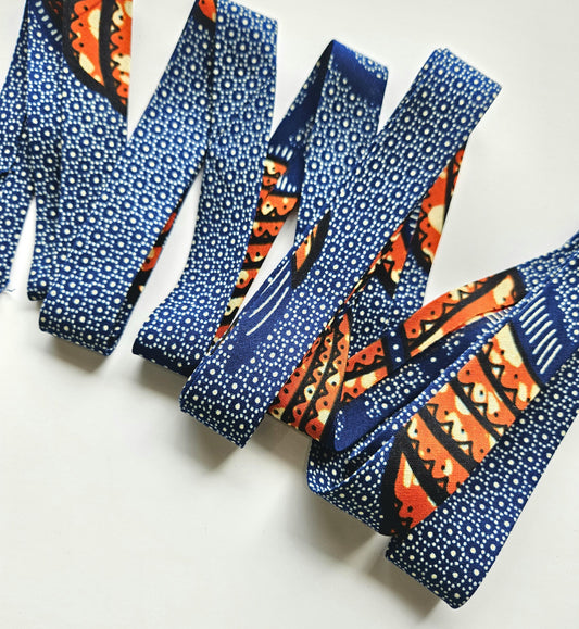 Navy Blue & Orange African Wax Fabric Bias Binding. 2.5cm Wide | Colourful Print Patterned Tape For Crafting / Quilting.