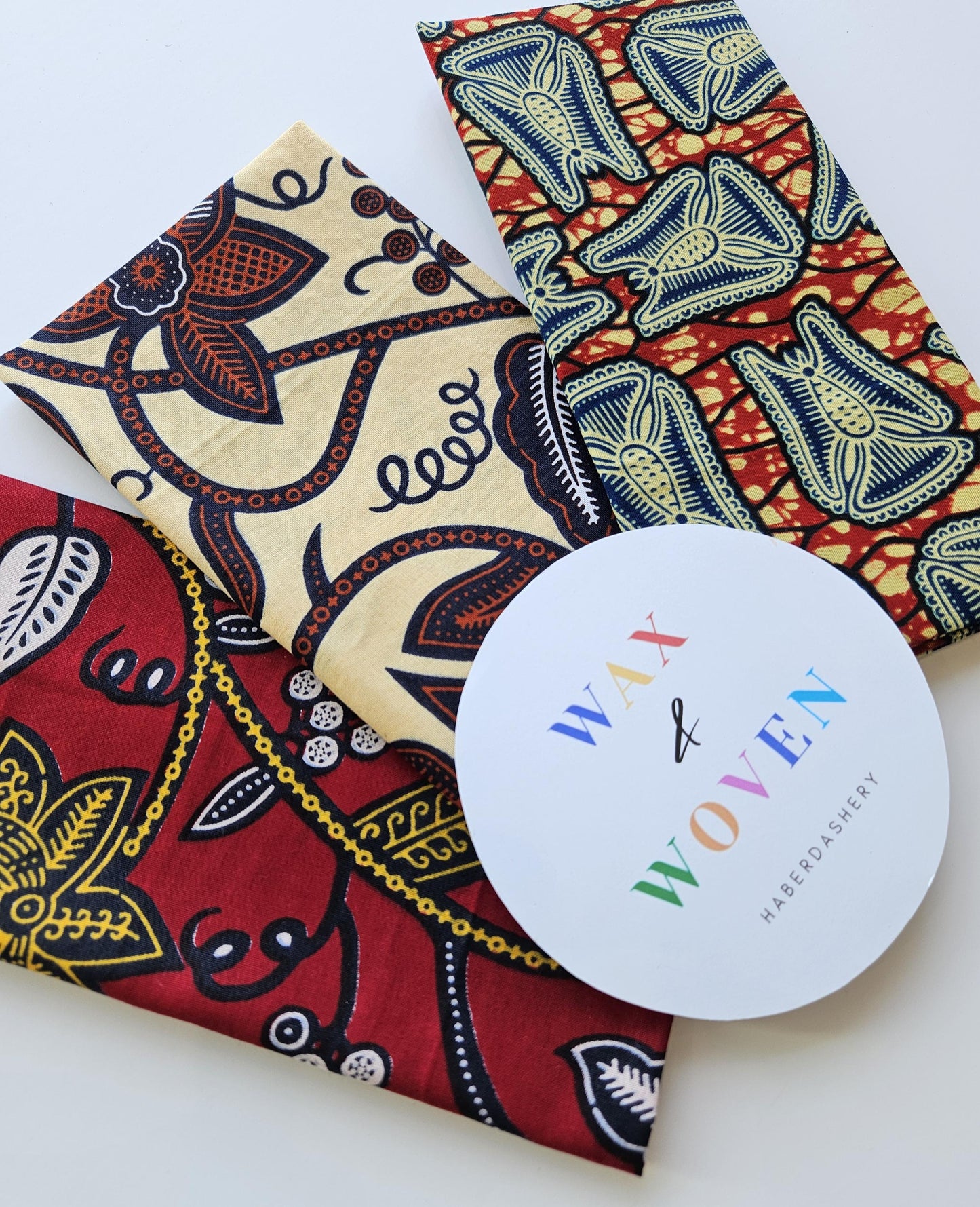 Set Of 3 African Wax Floral Themed Fabric Bias Binding. 5 Metres Each x  2.5cm Wide in Red, Beige, Blue and Brown For Crafting And Quilting.
