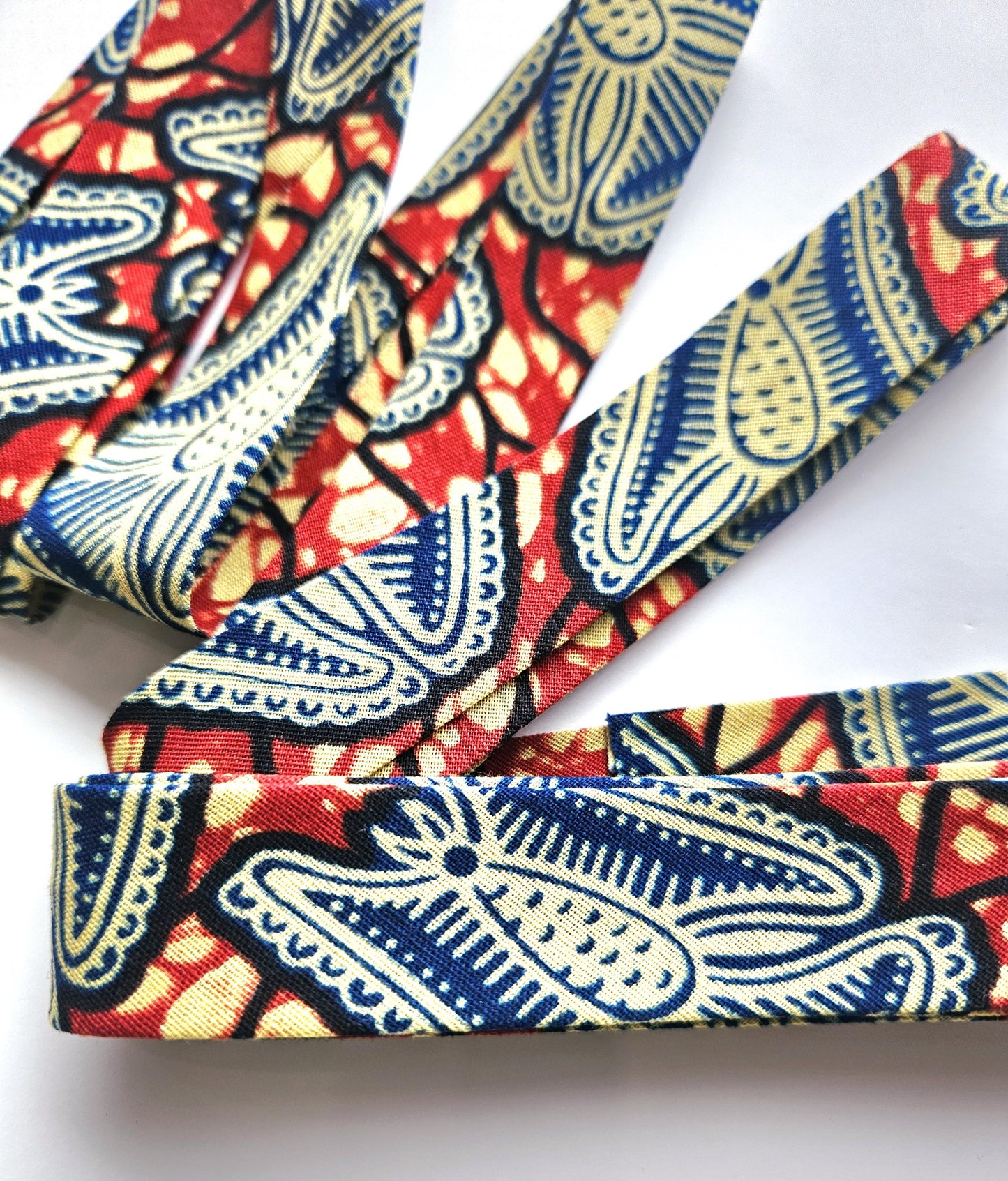 Set Of 3 African Wax Floral Themed Fabric Bias Binding. 5 Metres Each x  2.5cm Wide in Red, Beige, Blue and Brown For Crafting And Quilting.