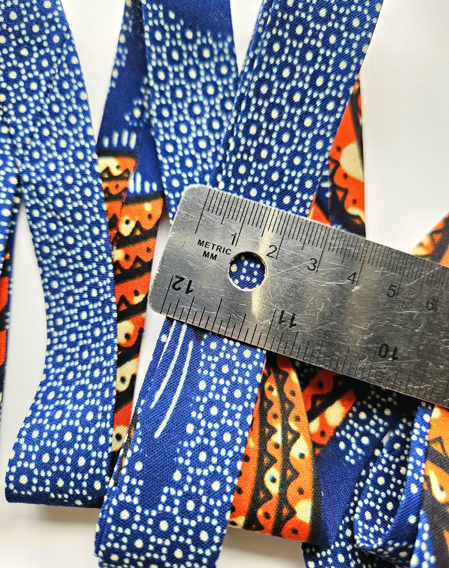 Navy Blue & Orange African Wax Fabric Bias Binding. 2.5cm Wide | Colourful Print Patterned Tape For Crafting / Quilting.
