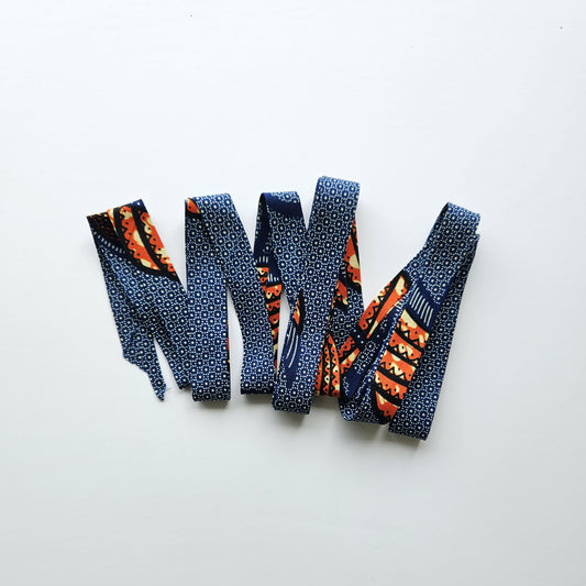 Navy Blue & Orange African Wax Fabric Bias Binding. 2.5cm Wide | Colourful Print Patterned Tape For Crafting / Quilting.