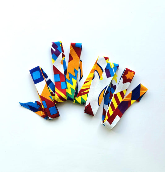 White & Multicoloured Kente African Wax Fabric Bias Binding. 2.5cm Wide | Colourful Print Patterned Tape For Crafting / Quilting.