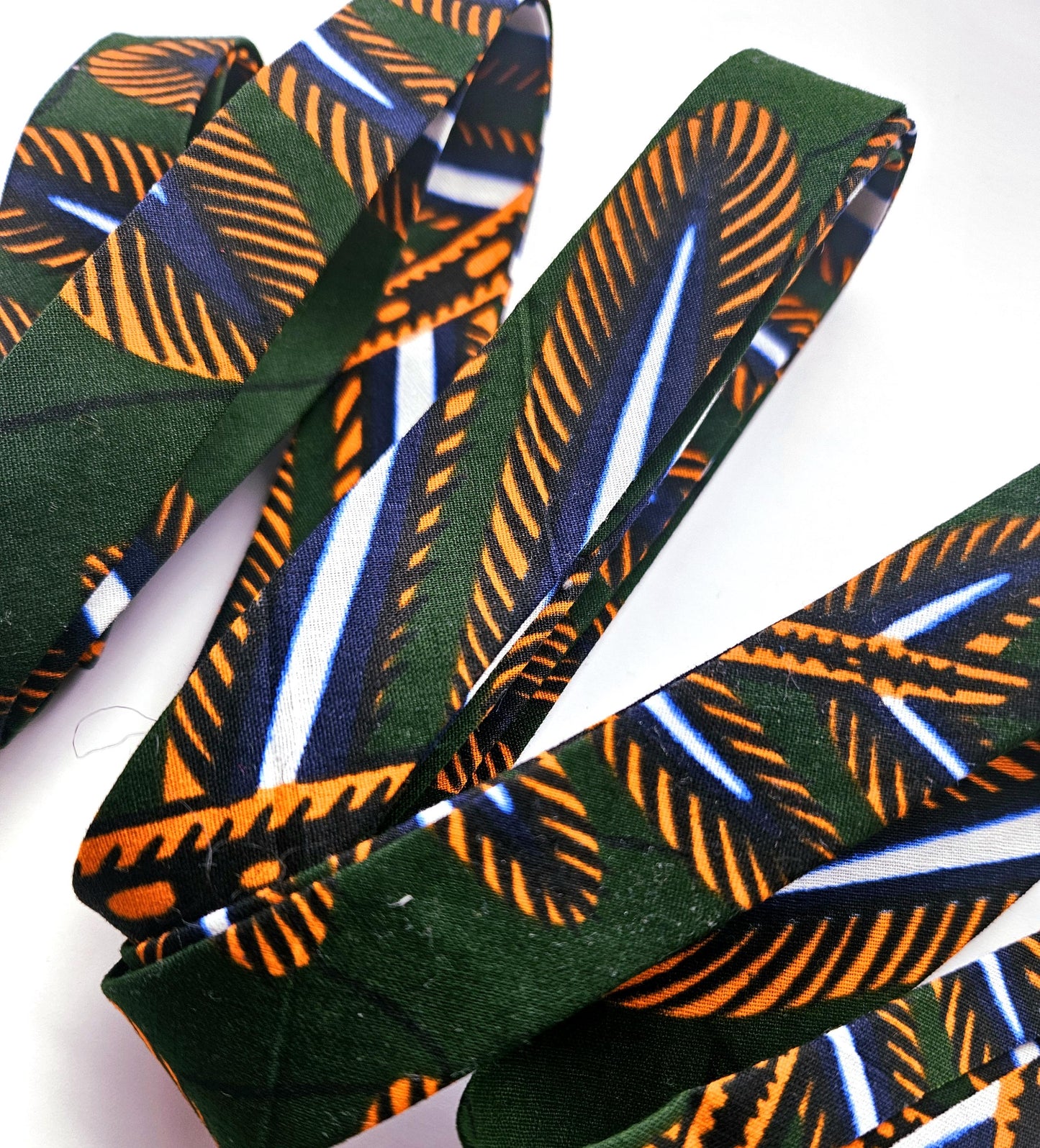 Green, Orange & White Wax Fabric 100% Cotton.