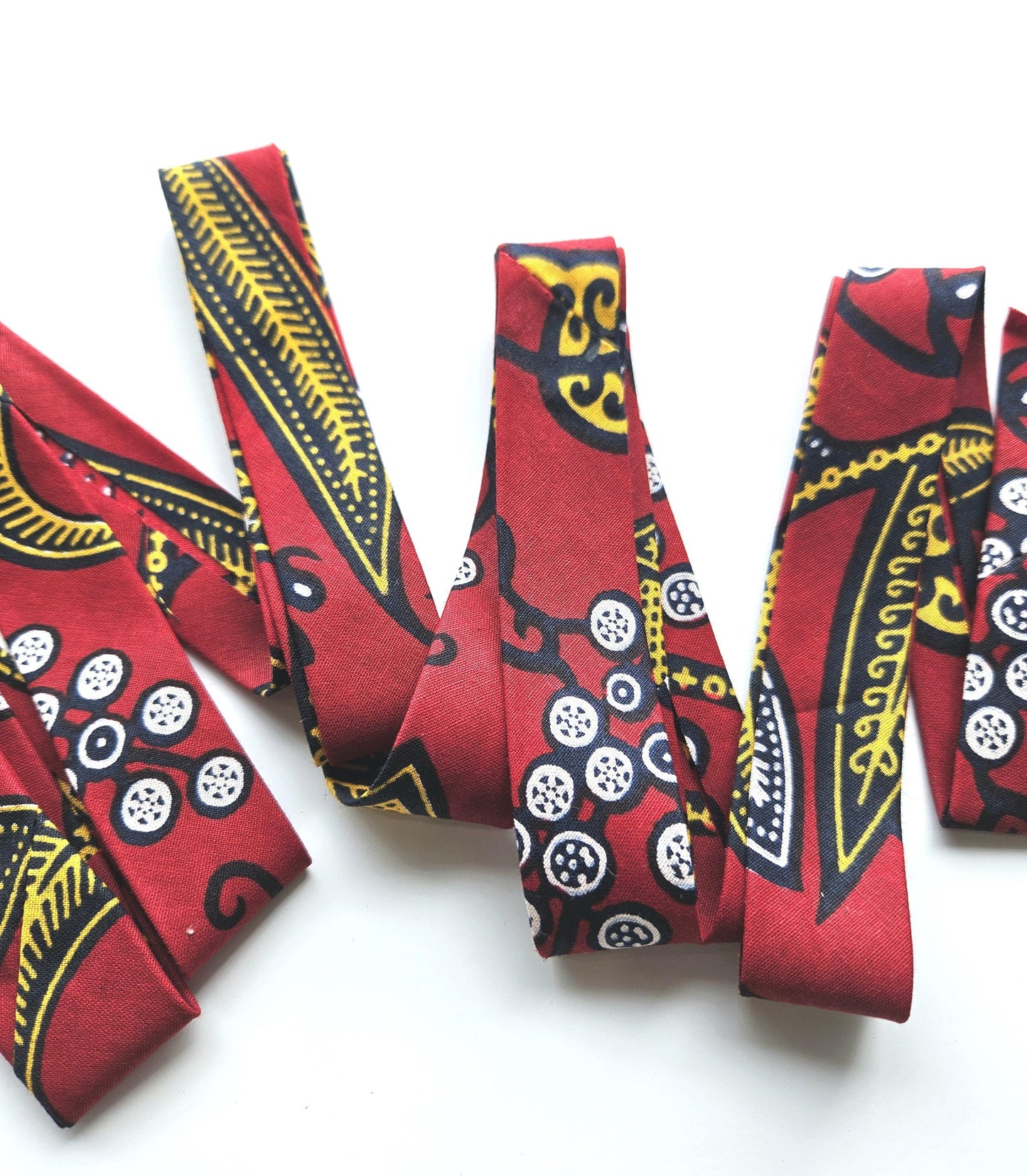 Set Of 3 African Wax Floral Themed Fabric Bias Binding. 5 Metres Each x  2.5cm Wide in Red, Beige, Blue and Brown For Crafting And Quilting.