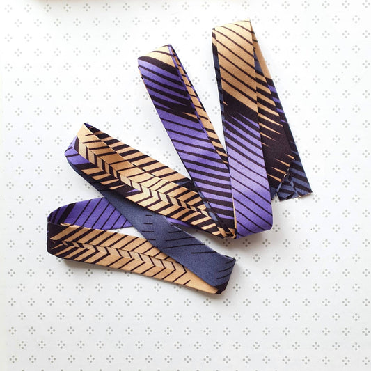 Lilac & beige wax bias tape. 3 metres x 2.5cm wide. 100% soft cotton.